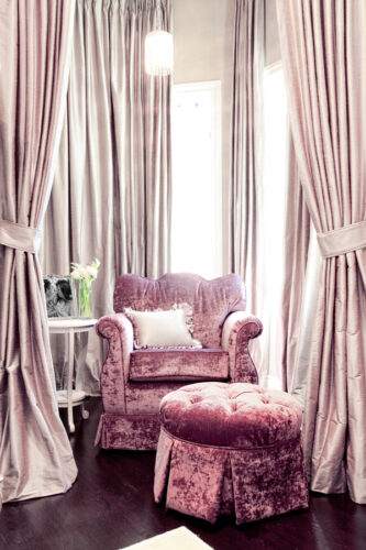 Purple velvet nursery glider