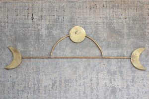 brass moon wall hanging