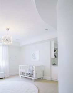 All White Celestial Nursery by Little Crown Interiors