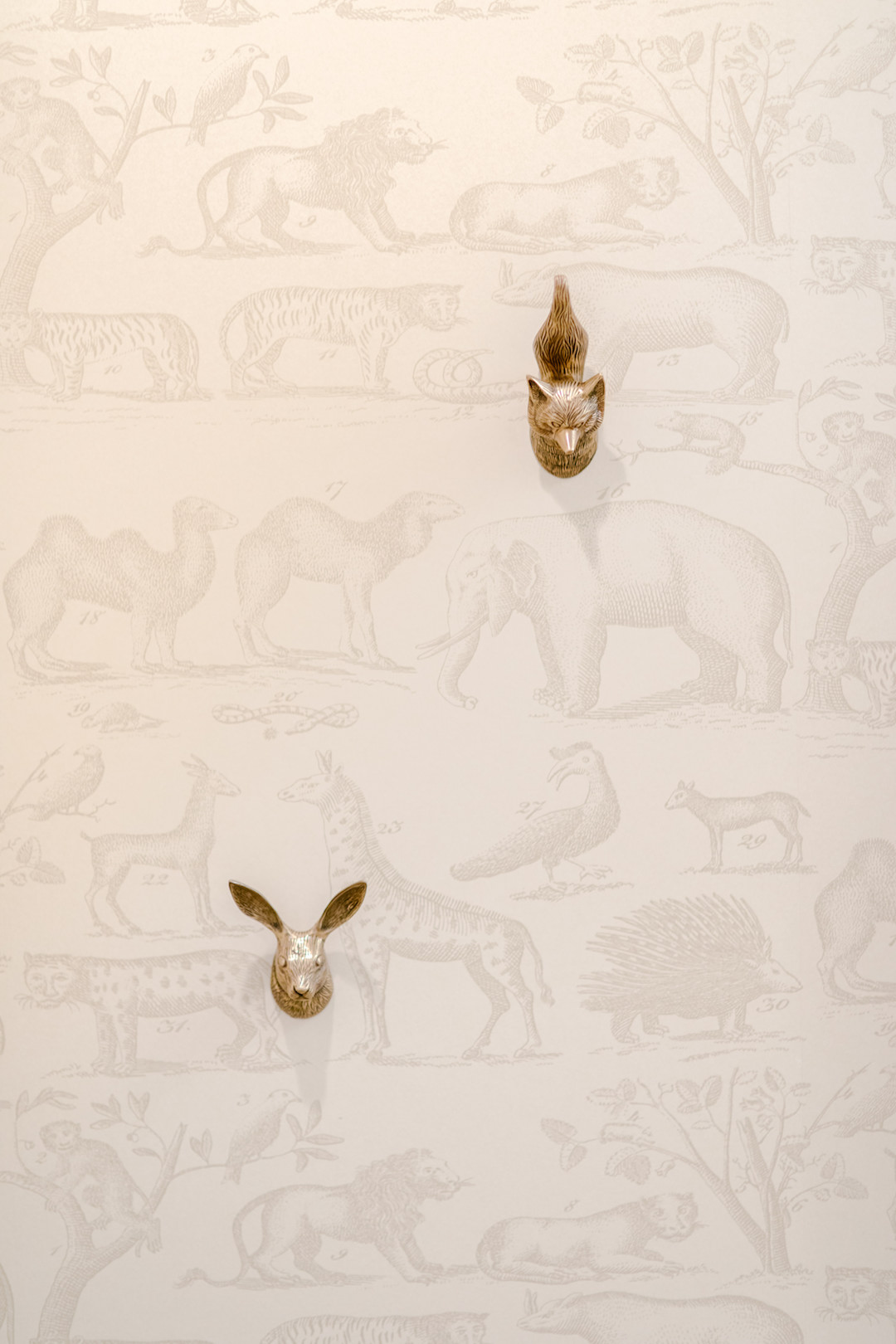Nursery Interior Design in Los Angeles by Little Crown Interiors Neutral Nursery Wall Hooks | Little Crown Interiors