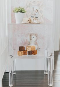 Pink Nursery with Acrylic Table by Little Crown Interiors