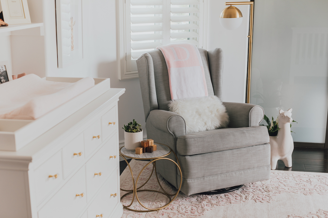 Pink Nursery with Gray Glider by Little Crown Interiors