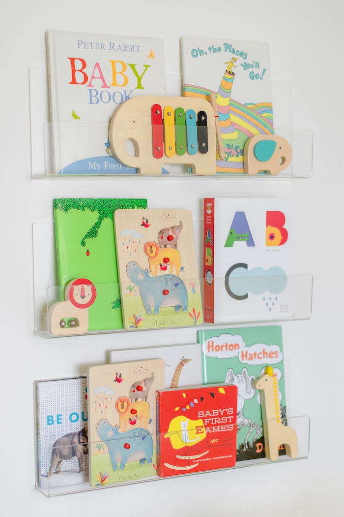 acrylic-wall-ledges Colorful Safari Nursery Design by Little Crown Interiors