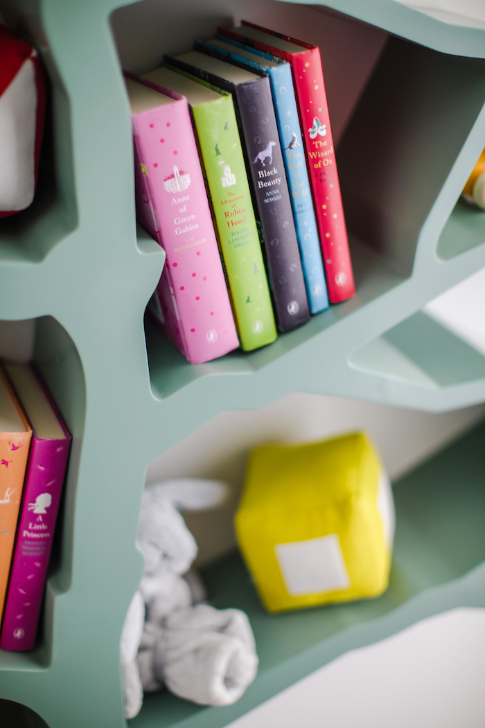 nursery-works-tree-bookcase Colorful Safari Nursery Design by Little Crown Interiors