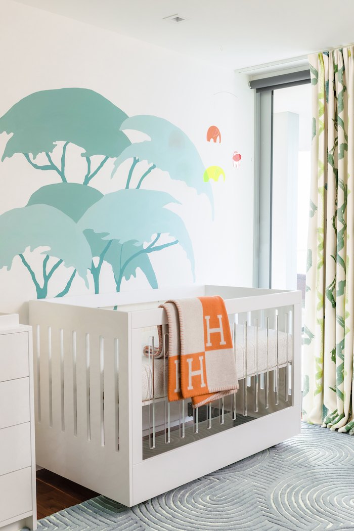 safari-nursery-wall-mural Colorful Safari Nursery Design by Little Crown Interiors