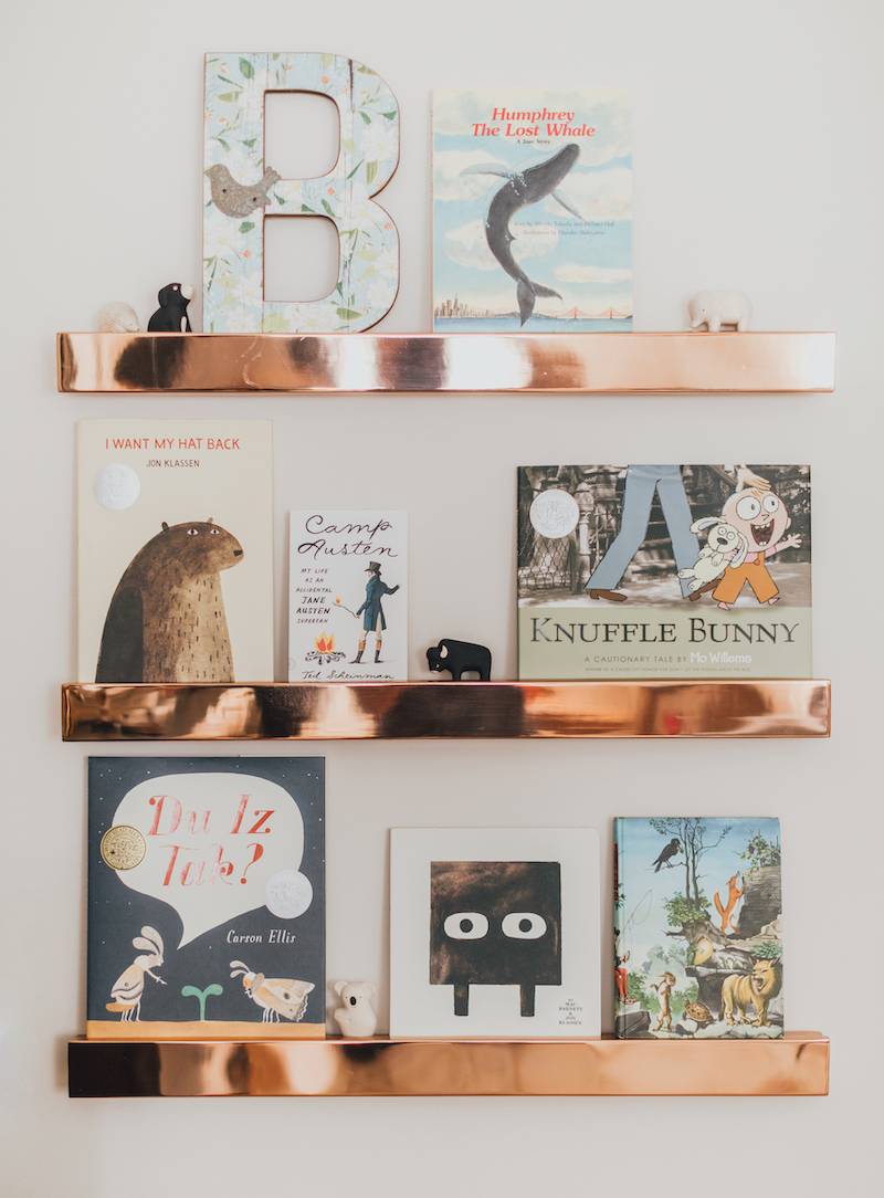 Pretty Books on Rose Gold Wall Ledges