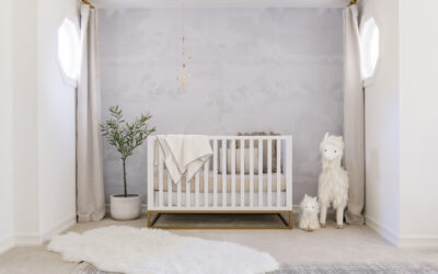 A Neutral Nursery Design with Cloud Wallpaper