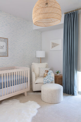 Neutral Nursery Design with Soft Blue Accents