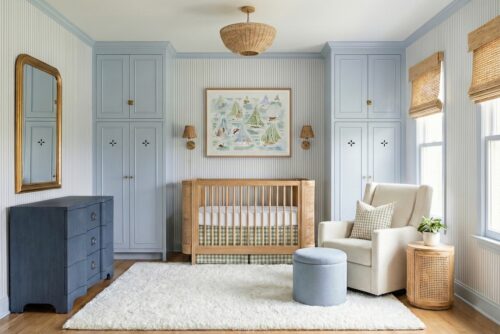 Blue Coastal Nursery Design With Wood Crib