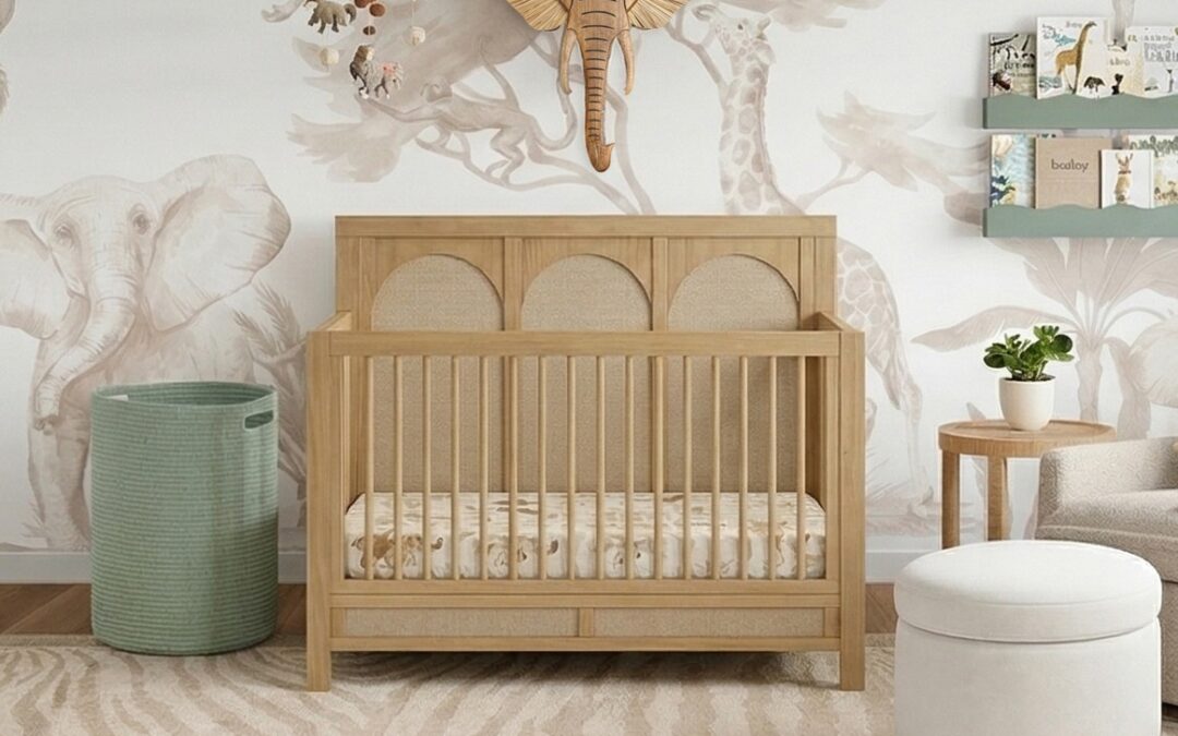 A Safari Theme Nursery With an Animal Wall Mural